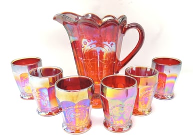 Red carnival glass 'Good Luck' pitcher