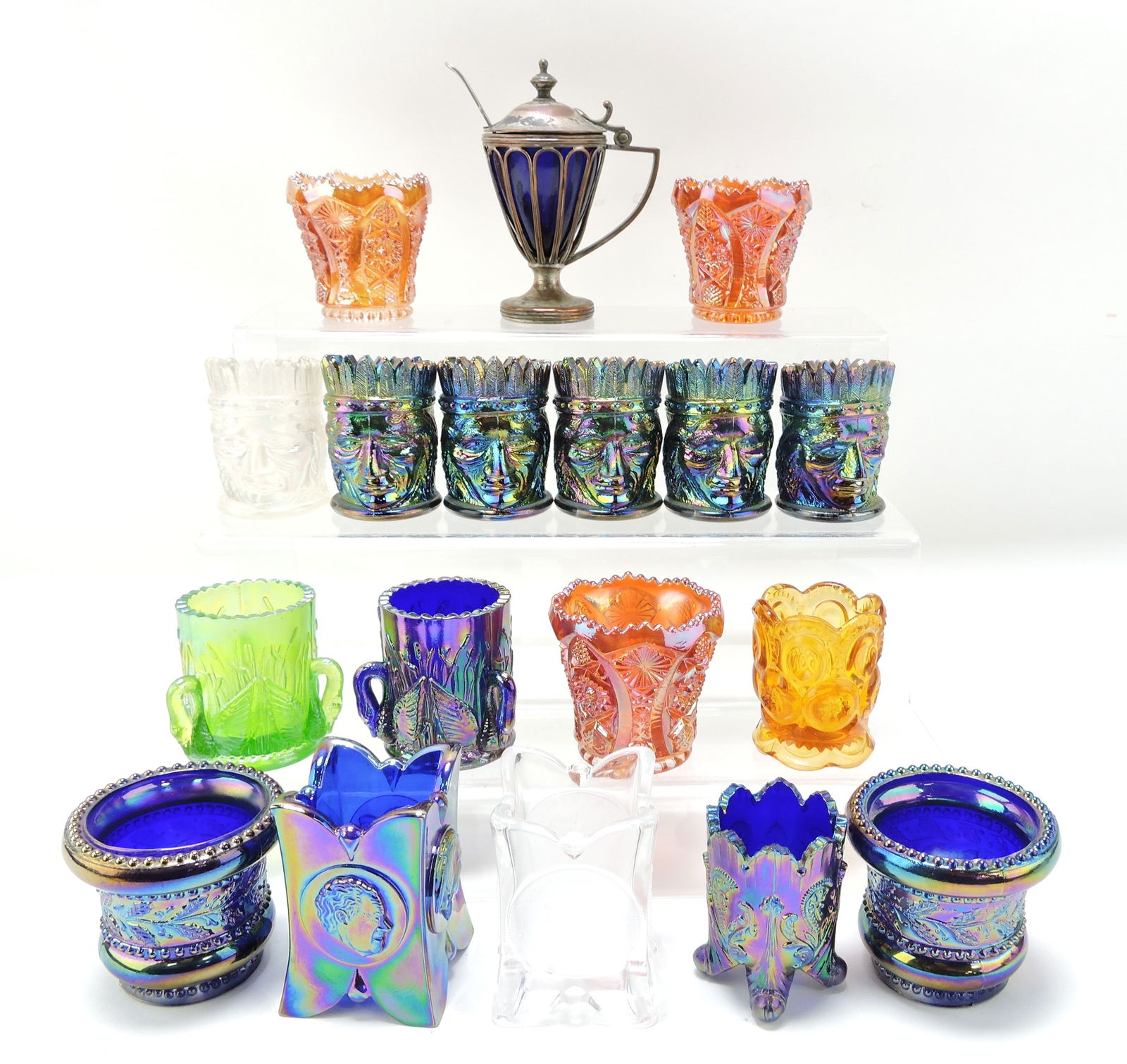Carnival glass and other lot of: 17 toothpick holders and mustard pot, including St. Clair, Imperial, and more