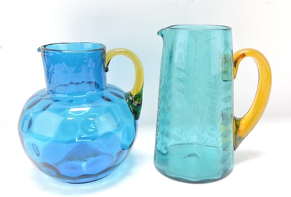 Lot of 2 blue glass pitchers with amber