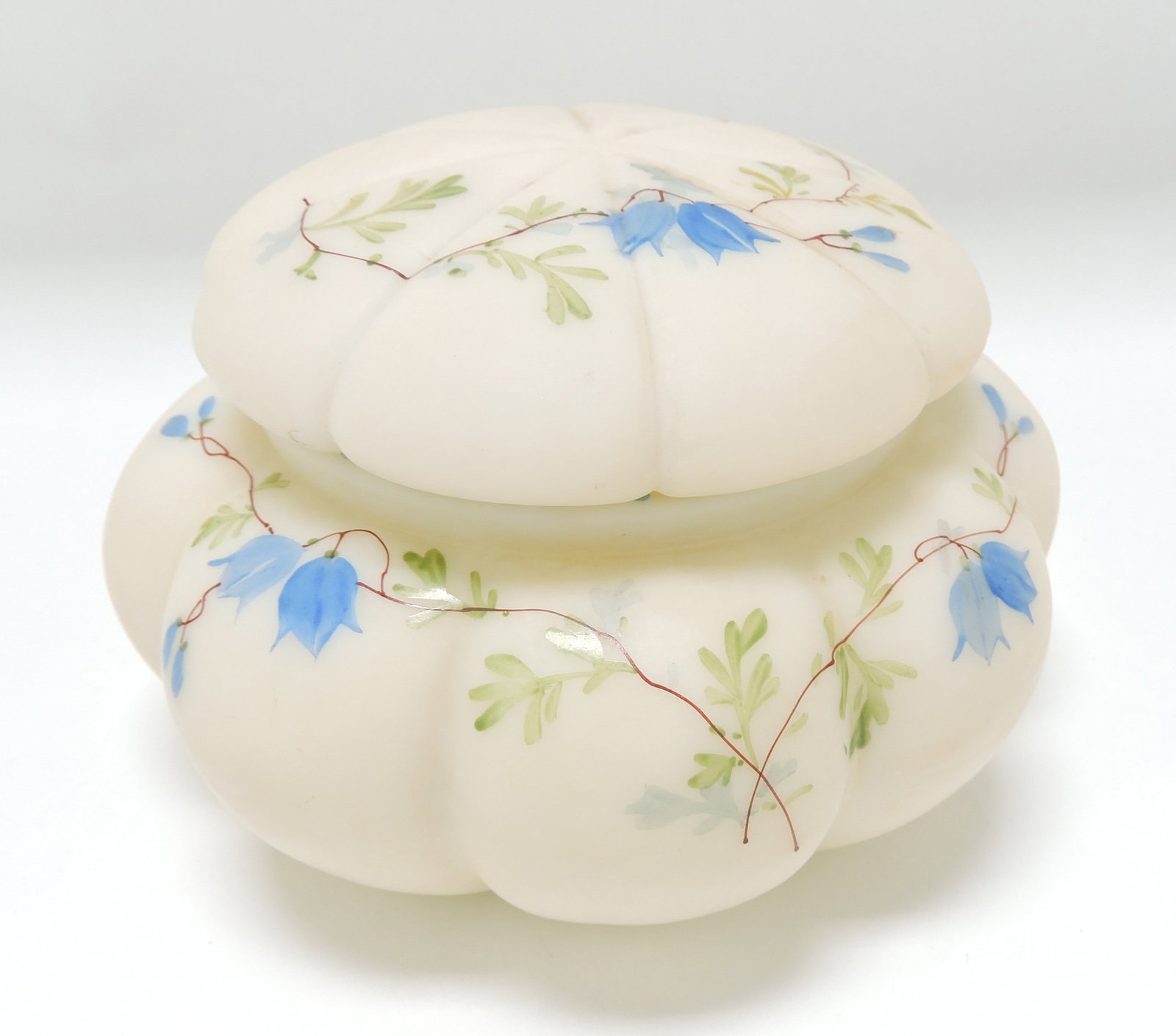 Satin glass floral enameled powder jar: 3 1/2"x5 1/2", minor rim nick to jar