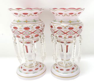 Pair of cranberry cut cased candle