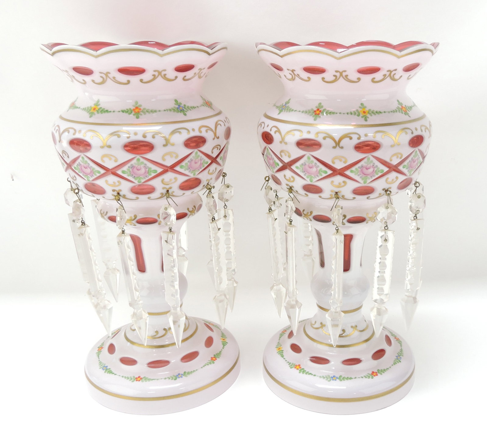 Pair of cranberry cut cased candle: lusters with prisms 13 1/2"