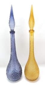 MCM pair of tall glass decanters,