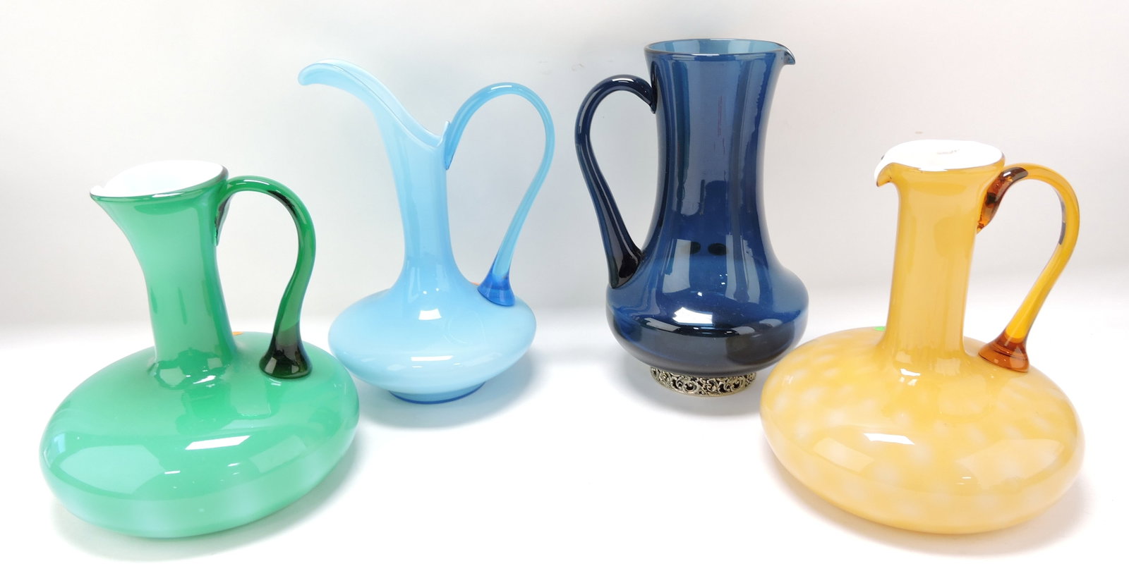 Murano MCM lot of 4 ewers,: 9" to 10 1/2"