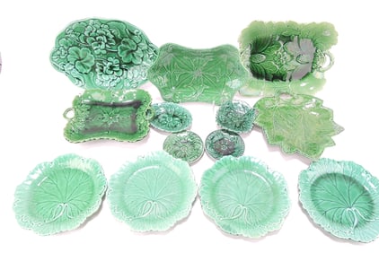 Dark green majolica lot of 13 plates,