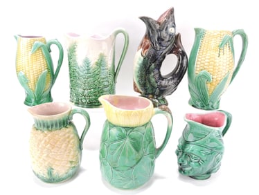 Majolica lot of 7 pitchers, 7" to 11",