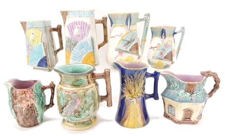 Majolica lot of 8 jugs, 6" to 9",