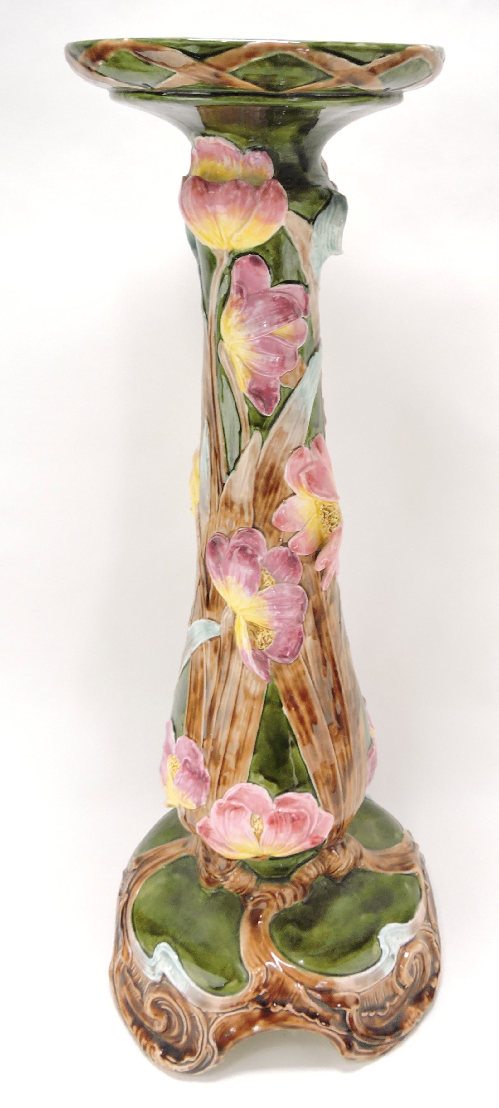 Continental majolica pedestal with flowers: in high relief, 32"h, 14'w