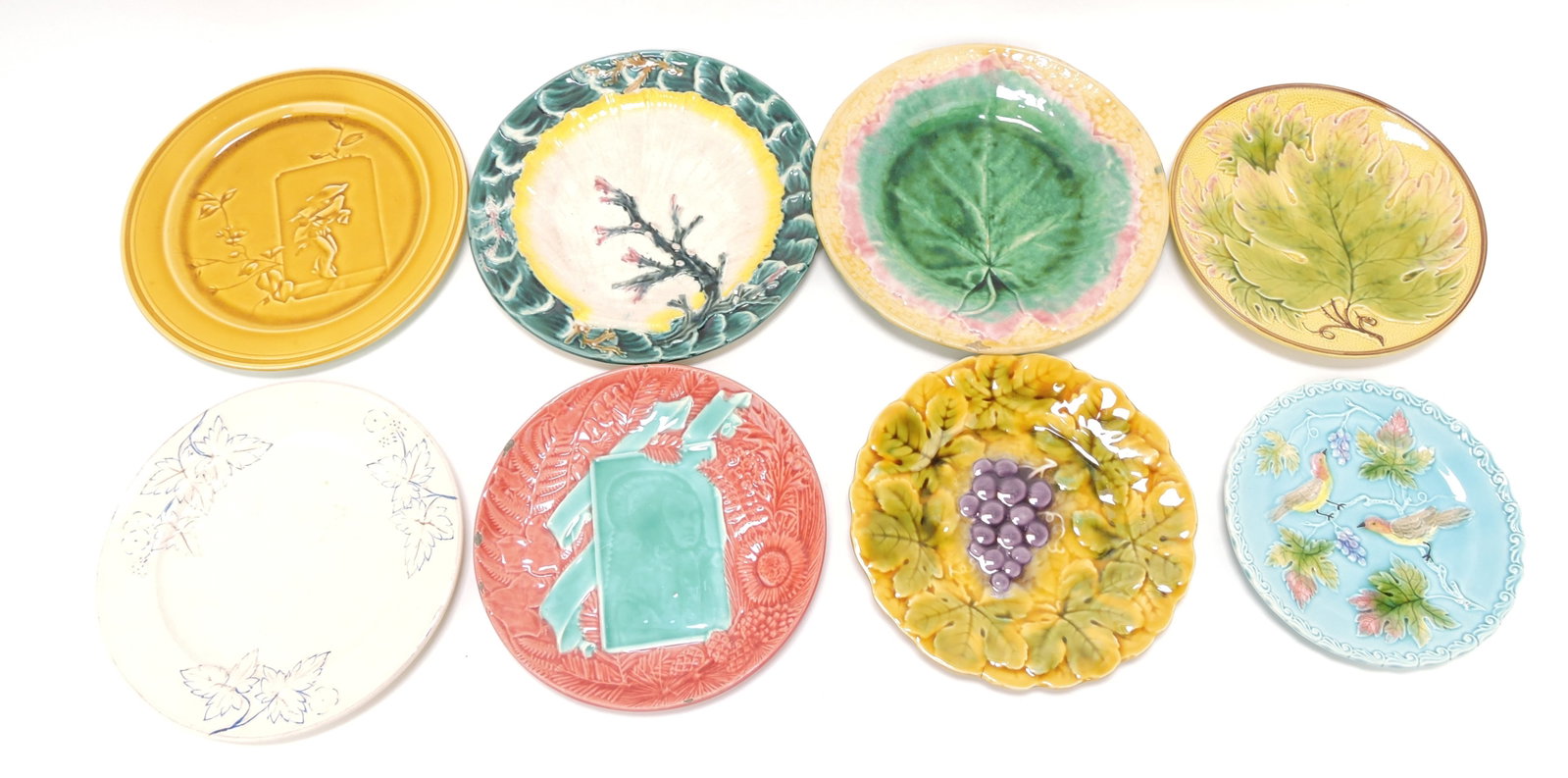 Majolica lot of 8 plates, 7" to 9": .