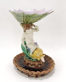 Majolica cherub, dolphin and shell table