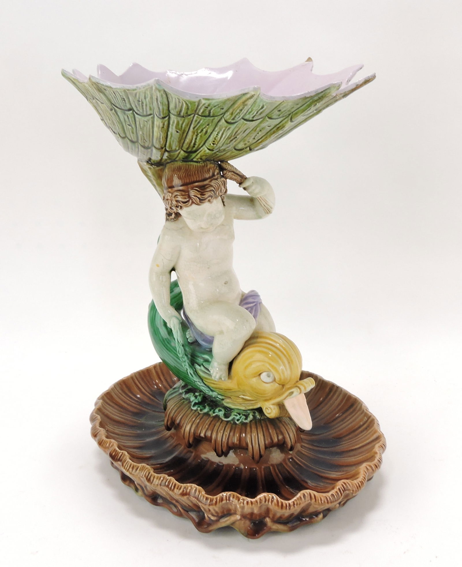 Majolica cherub, dolphin and shell table: center, restorations, 13"h, 11"w