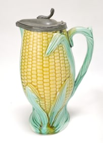 Majolica corn syrup jug with pewter top,