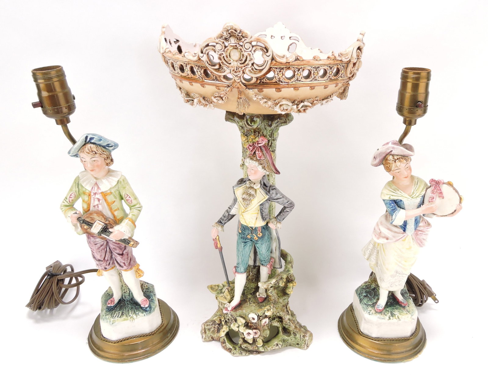 Continental figural comport and pair of: figural lamps, 15" to 17"