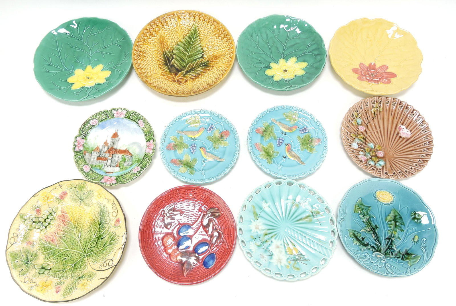 Majolica lot of 12 plates, 6" to 8 1/2",: various condition