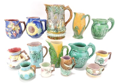 Majolica lot of 14 pitchers and creamers,