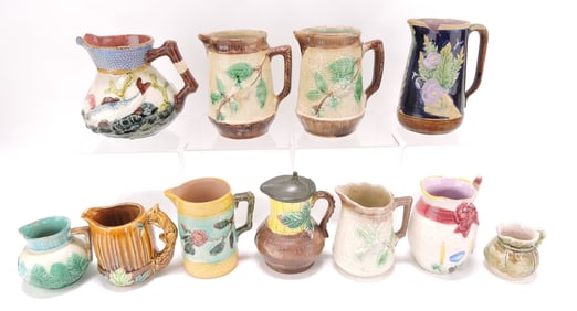 Majolica lot of 11 pitchers & creamers,