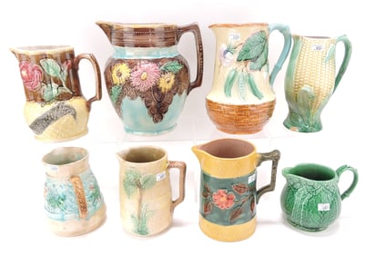 Majolica lot of 8 pitchers, 5" to 9",