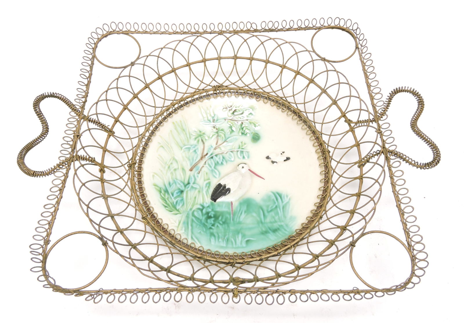 Majolica plate with stork mounted in: wire basket, 12"