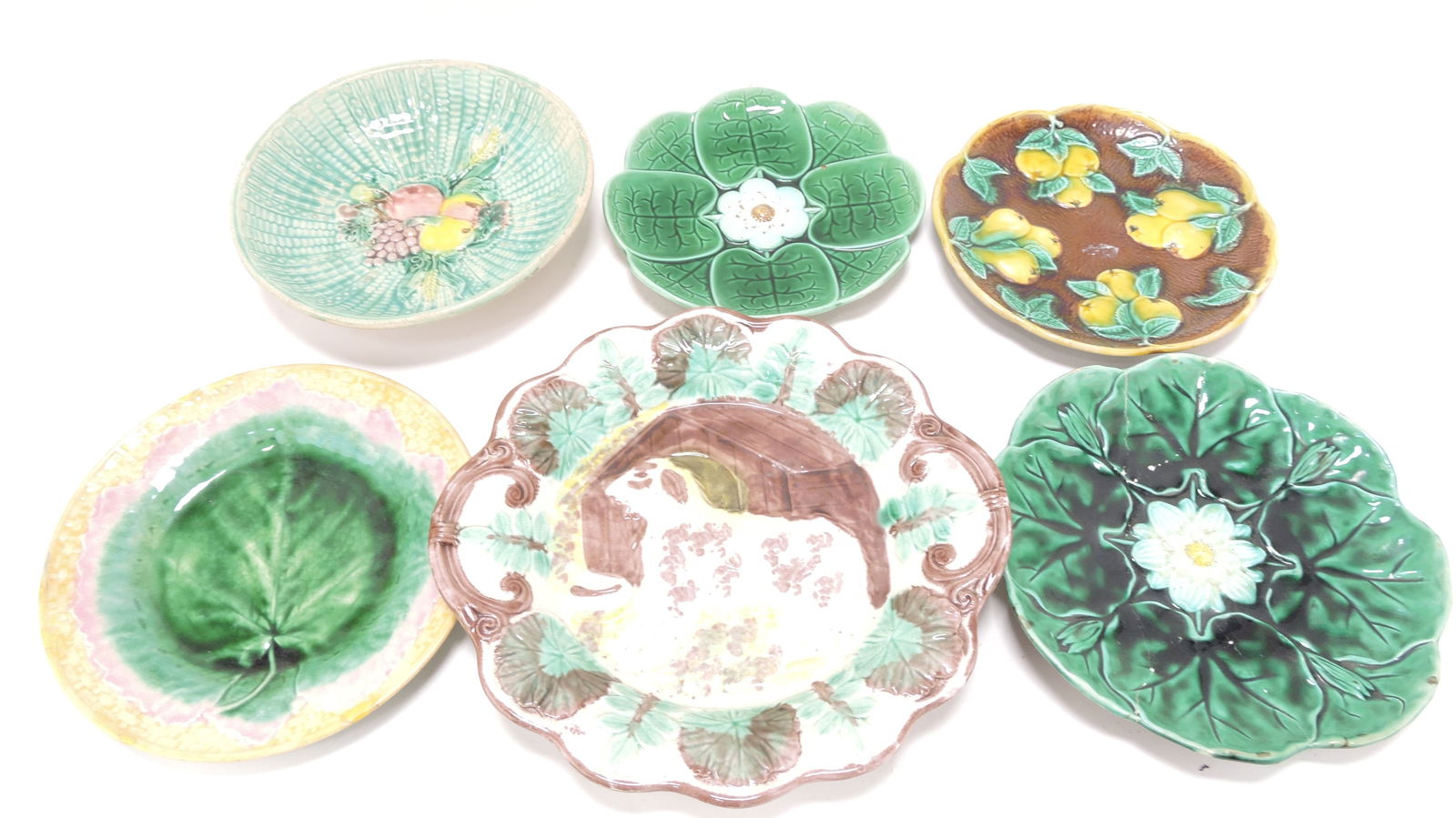 Majolica lot of 6 plates, platter, and: bowl, 8" to 11", various condition