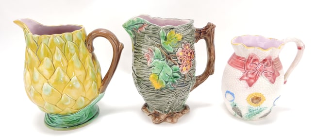 Majolica lot of 3 pitchers, 6" to 7 1/2"
