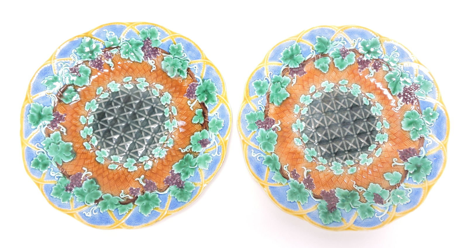Wedgwood majolica pair of grape: vine and wicker 9" plates, one repaired