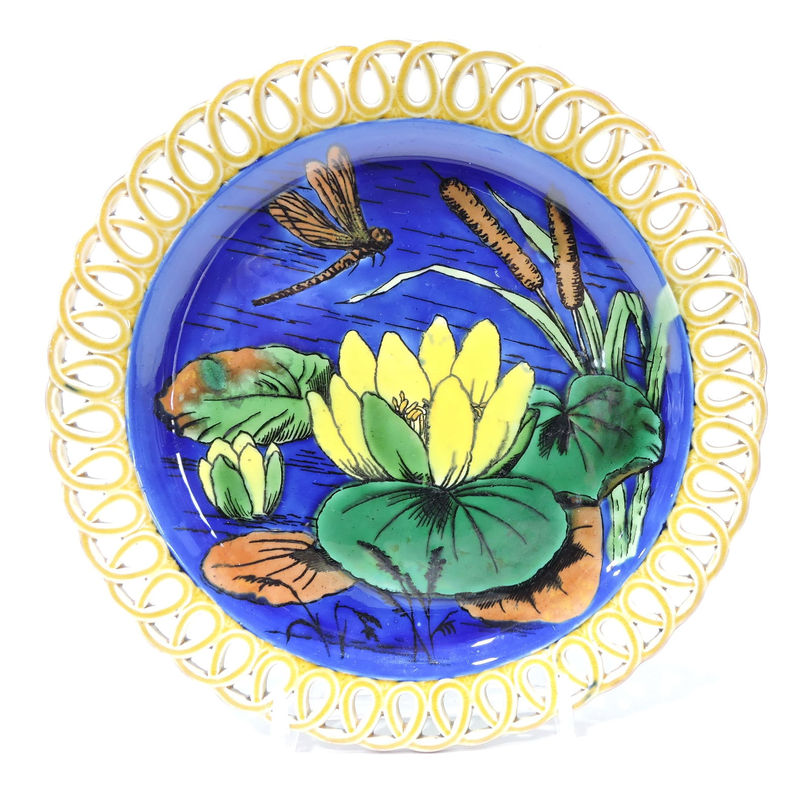 Wedgwood majolica plate, reticulated: wicker border, cobalt center with water lily and dragonfly, 9"