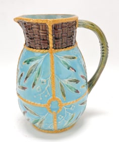 Fielding majolica pitcher with wicker