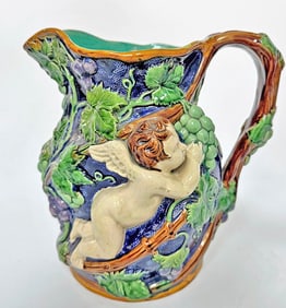 Large Minton Majolica putti wine ewer,