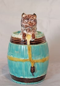 J. Holdcroft Majolica dog in barrel