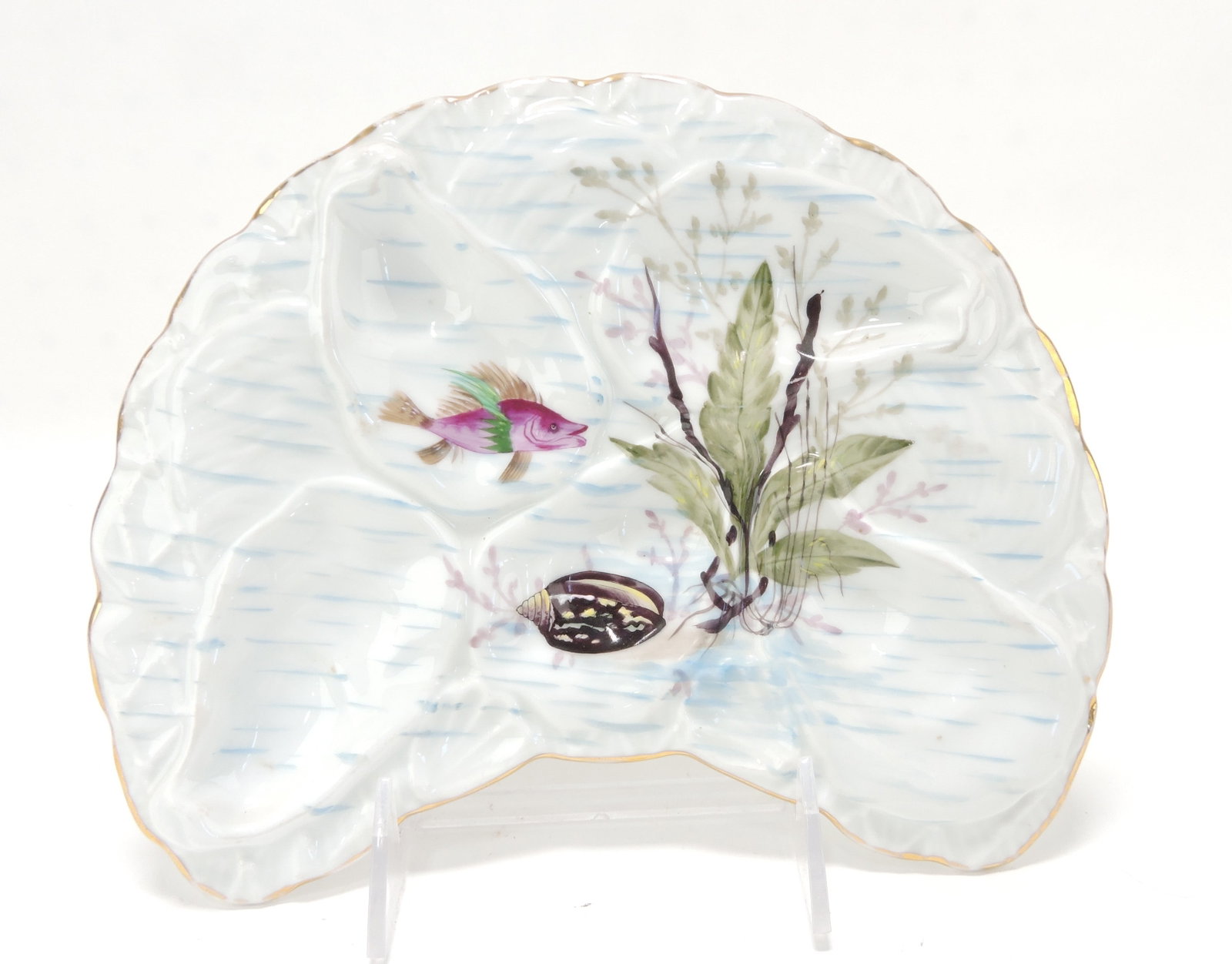Porcelain crescent shape five well: oyster plate with fish and seaweed motif, 9"