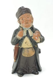 Terra cotta figural tobacco jar of a