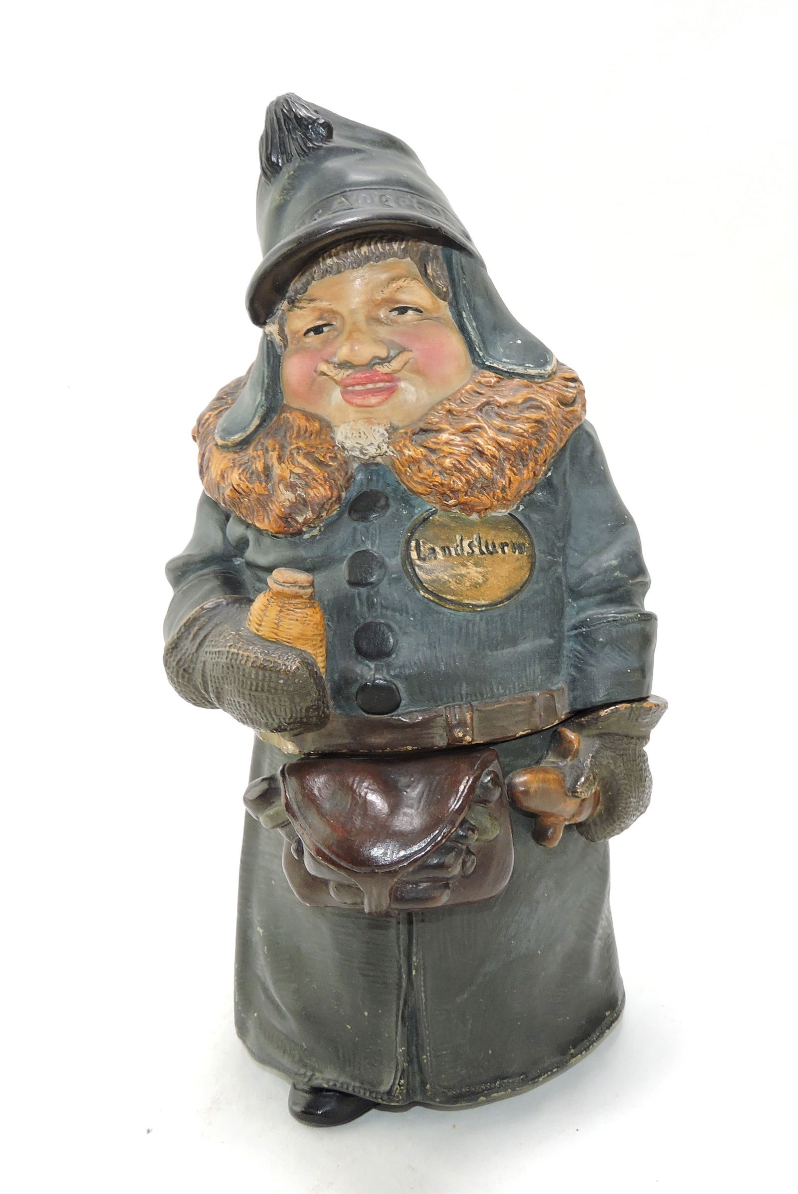 J. Maresch 3233 figural tobacco jar: of a man with coat with fur collar and a flask, 12", ref. Figural Humidors by Horowitz #360