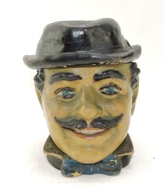 Terra cotta figural tobacco jar of