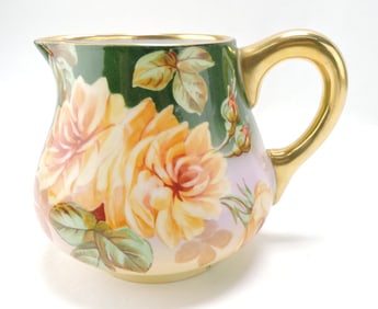 Limoges porcelain pitcher with
