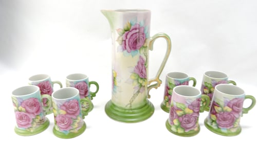 Porcelain hand painted tankard 14",
