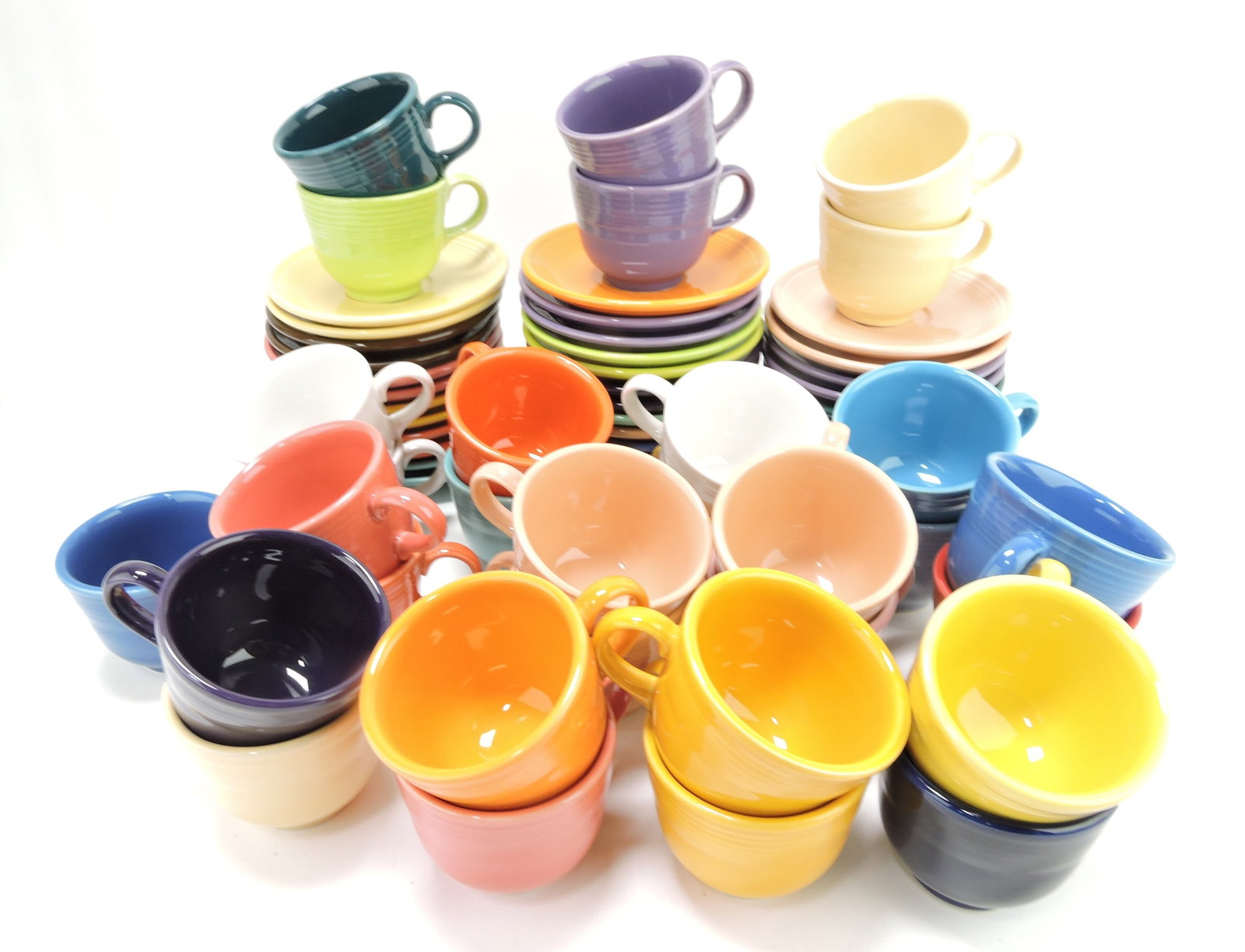 Fiesta Post 86 lot of 31 cups and: 35 saucers, mixed
