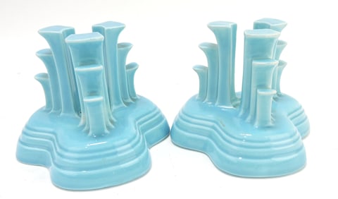 Fiesta pair of tripod candle holders,