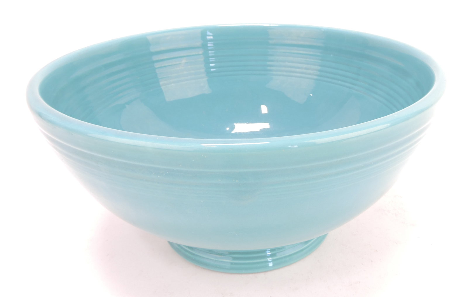 Fiesta footed salad bowl, turquoise,: glaze imperfection to bottom