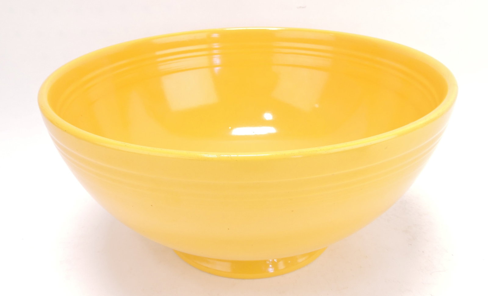 Fiesta footed salad bowl, yellow: .