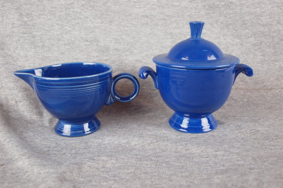 Fiesta cobalt cream and sugar, minor nick to finial : Fiesta cobalt cream and sugar, minor nick to finial