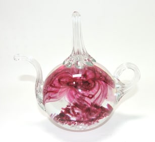 Prestige teapot door stop paperweight,