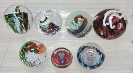 Lot of 7 paperweights, some signed