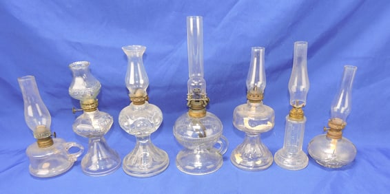 Lot of 7 miniature oil lamps, 8" to 11"