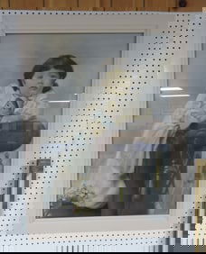 Large framed picture of girl with doll,