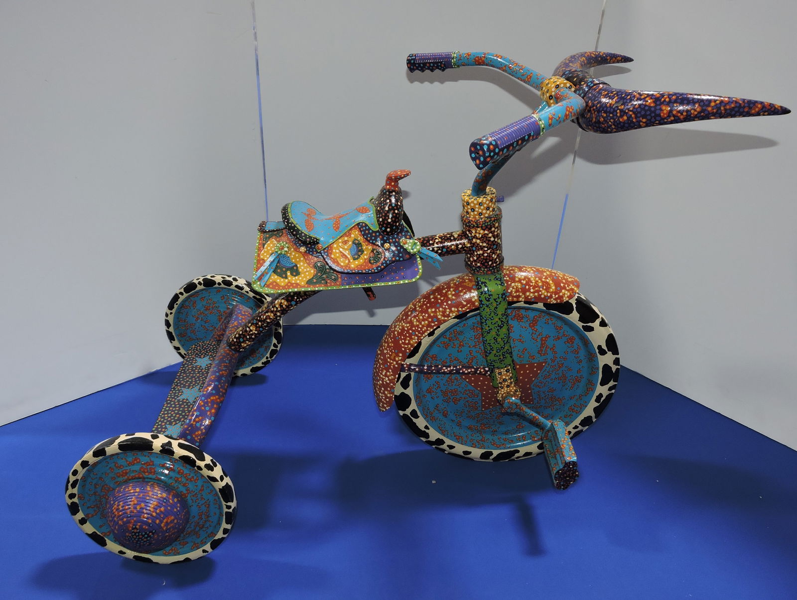 Rare one of a kind Michael Hapner: (Indiana) 'Cornbelt Cowboy' painted tri-cycle with long horns on handle bars, painted saddle