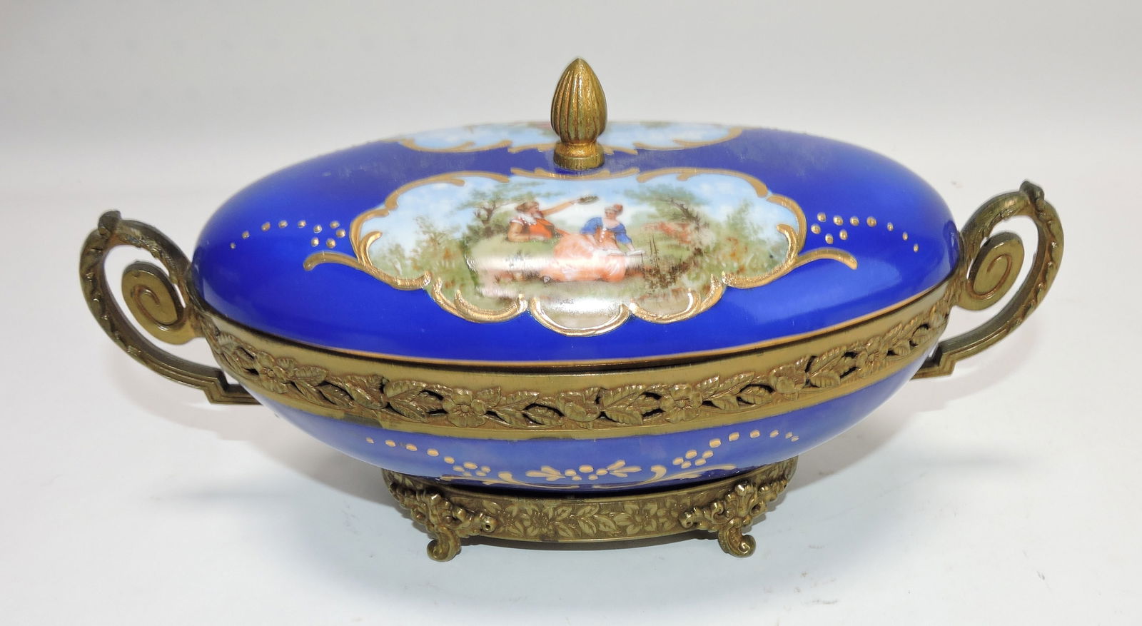 Brass mounted porcelain tureen,: 5 1/2"h, 10 1/2"l