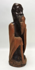 Wood carved figure by Duke Guthrie,