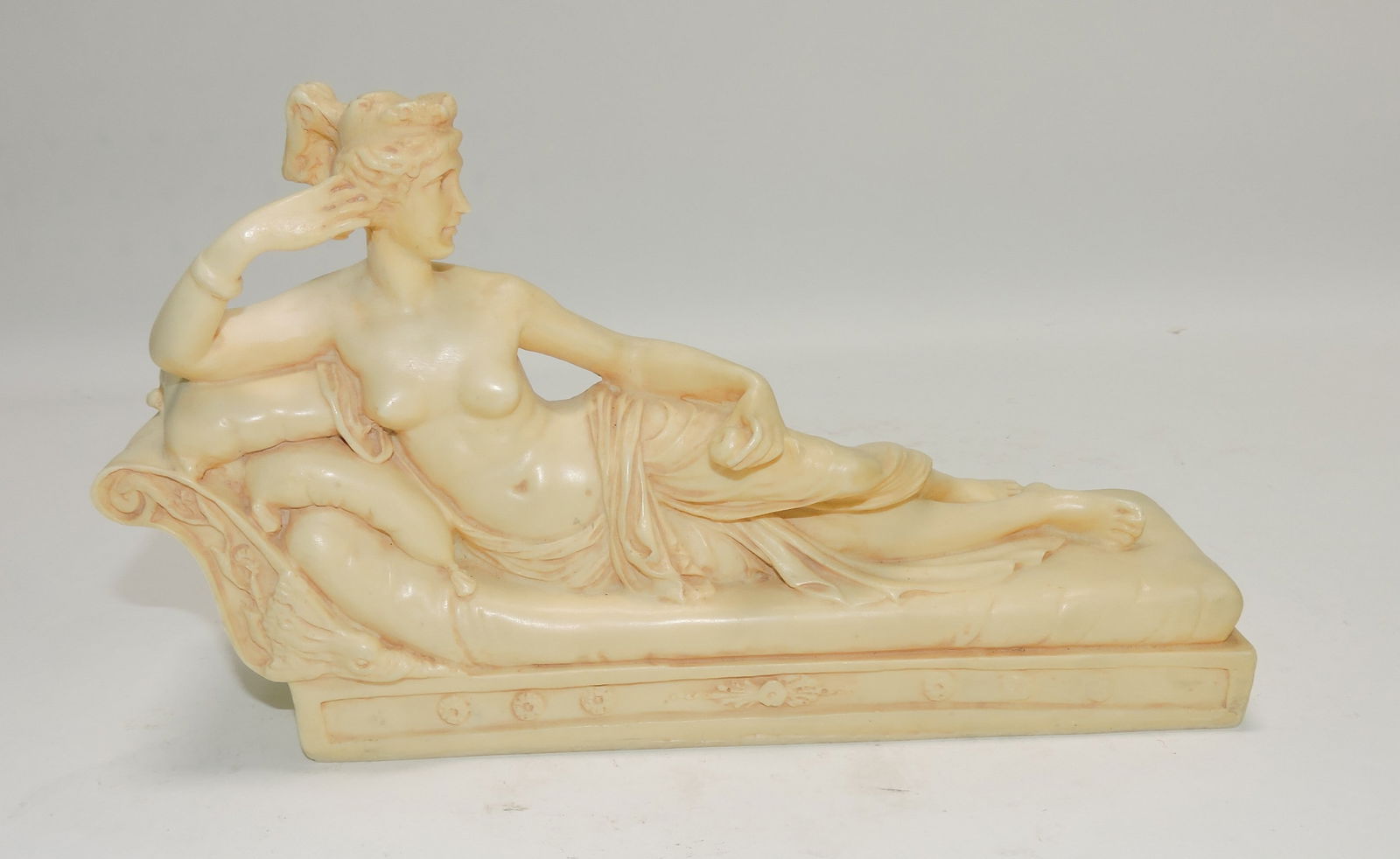 Semi-nude resin figure of recumbent lady,: 6"h, 10"l
