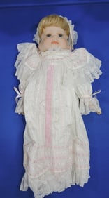 Turn-About bisque doll with 3 faces