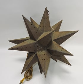 Folk art tin pierced starburst light,